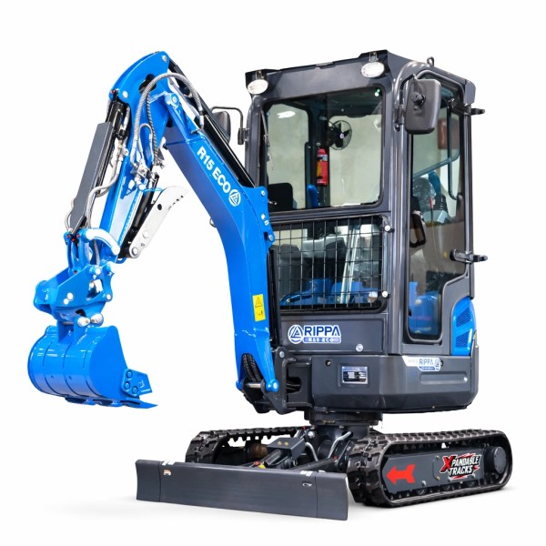 Rippa R15 enclosed cab mini excavator with hydraulic thumb, dozer blade, and rubber tracks isolated on white background