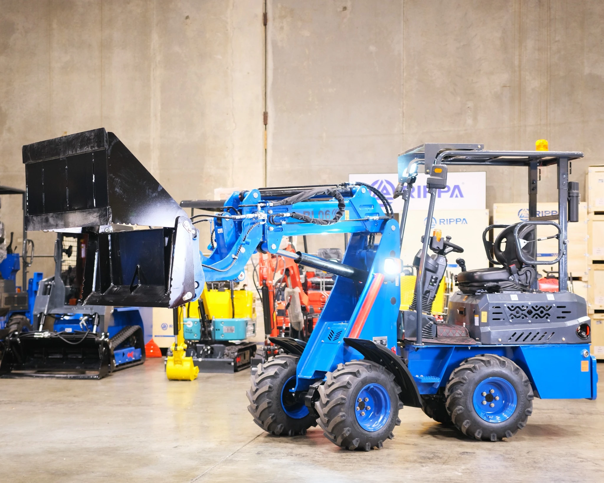 Rippa RL-06 4-in-1 bucket in dump position