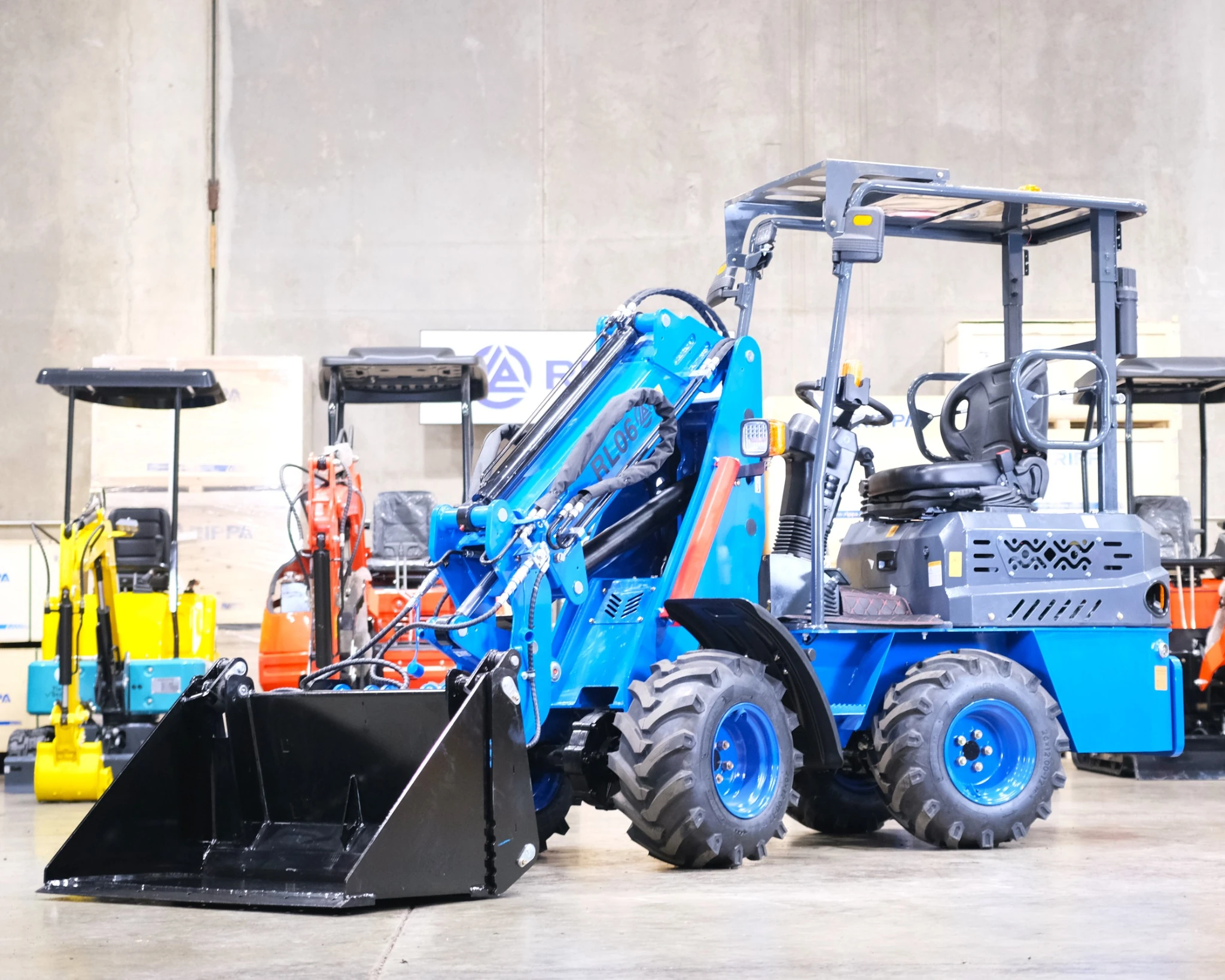 Rippa RL-06 compact wheel loader angled front view with telescopic arm