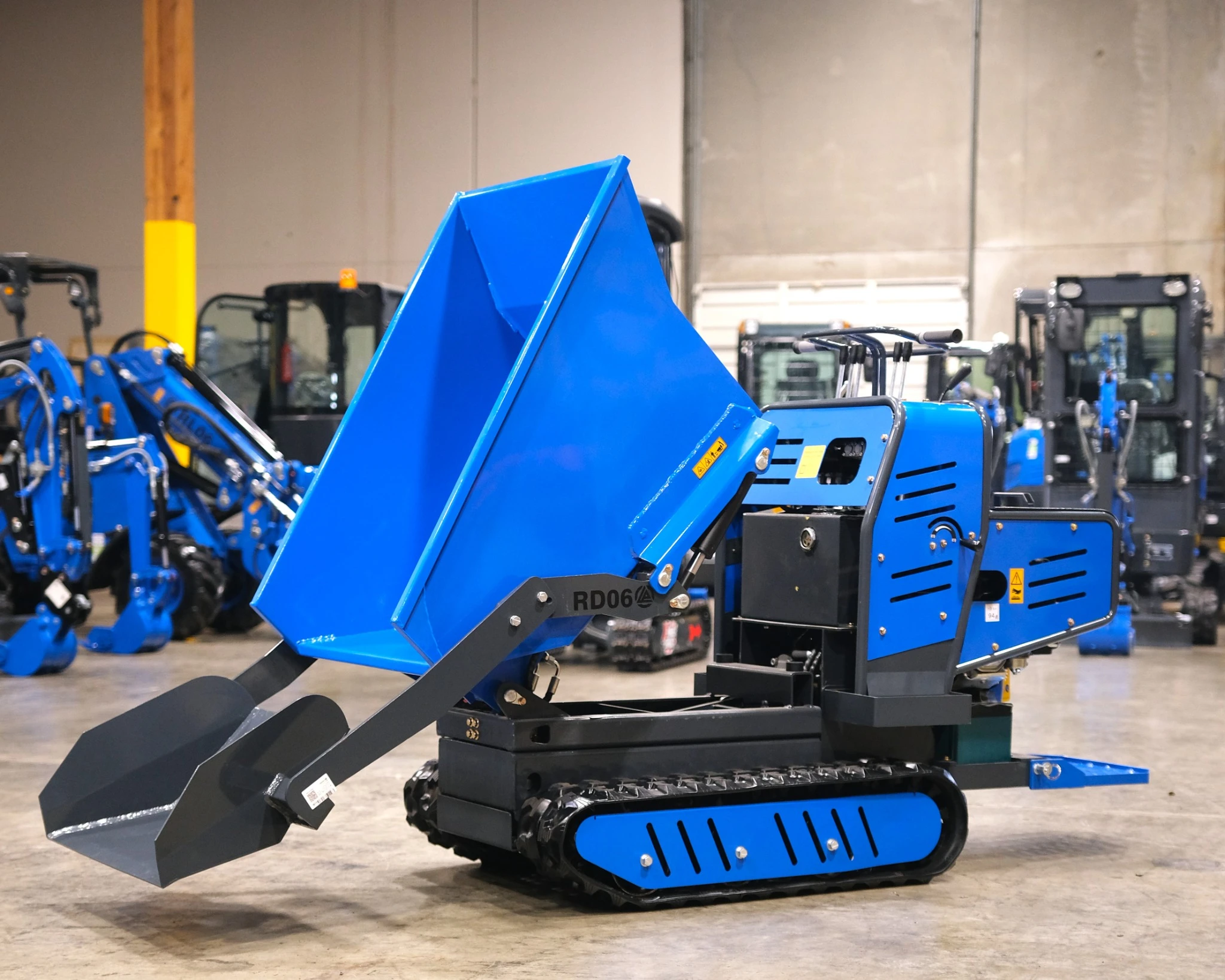 Full view of Rippa RD06 tracked self-loading dumper in warehouse