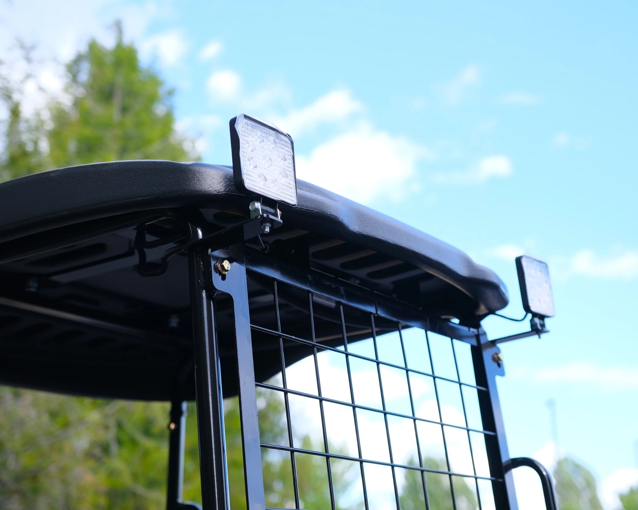 LED work lights mounted on the Rippa R15 Eco canopy