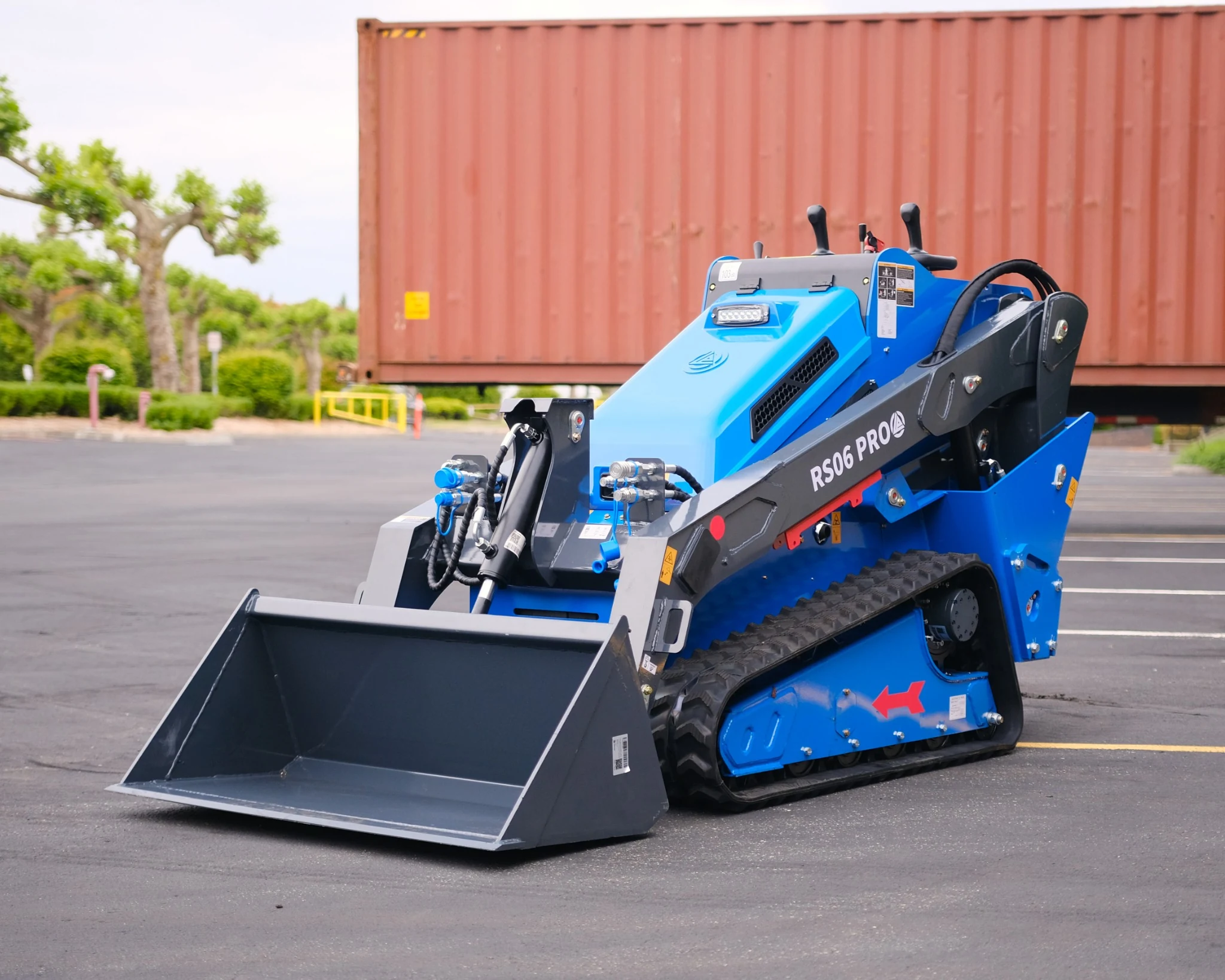 RIPPA RS06 PRO compact track loader with bucket, Kubota diesel engine, and vertical lift system