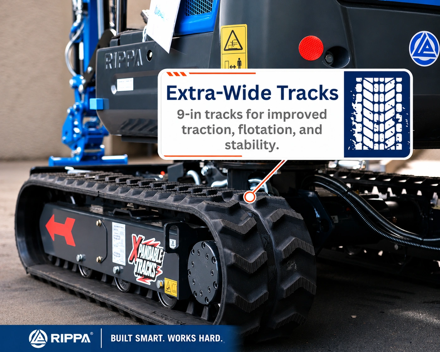 Close-up of extra-wide 9-inch tracks on the RIPPA R15 ECO mini excavator for better traction, flotation, and stability