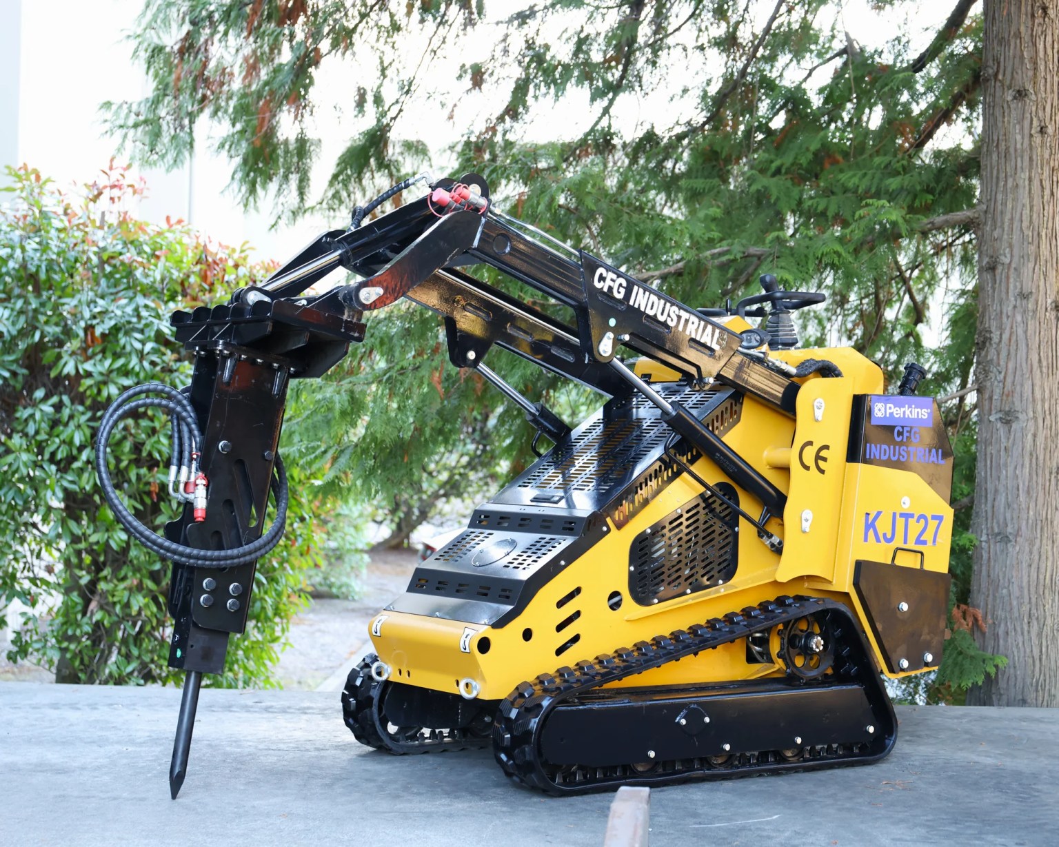 Yellow CFG KJT27 Perkins diesel mini skid steer with included hydraulic hammer