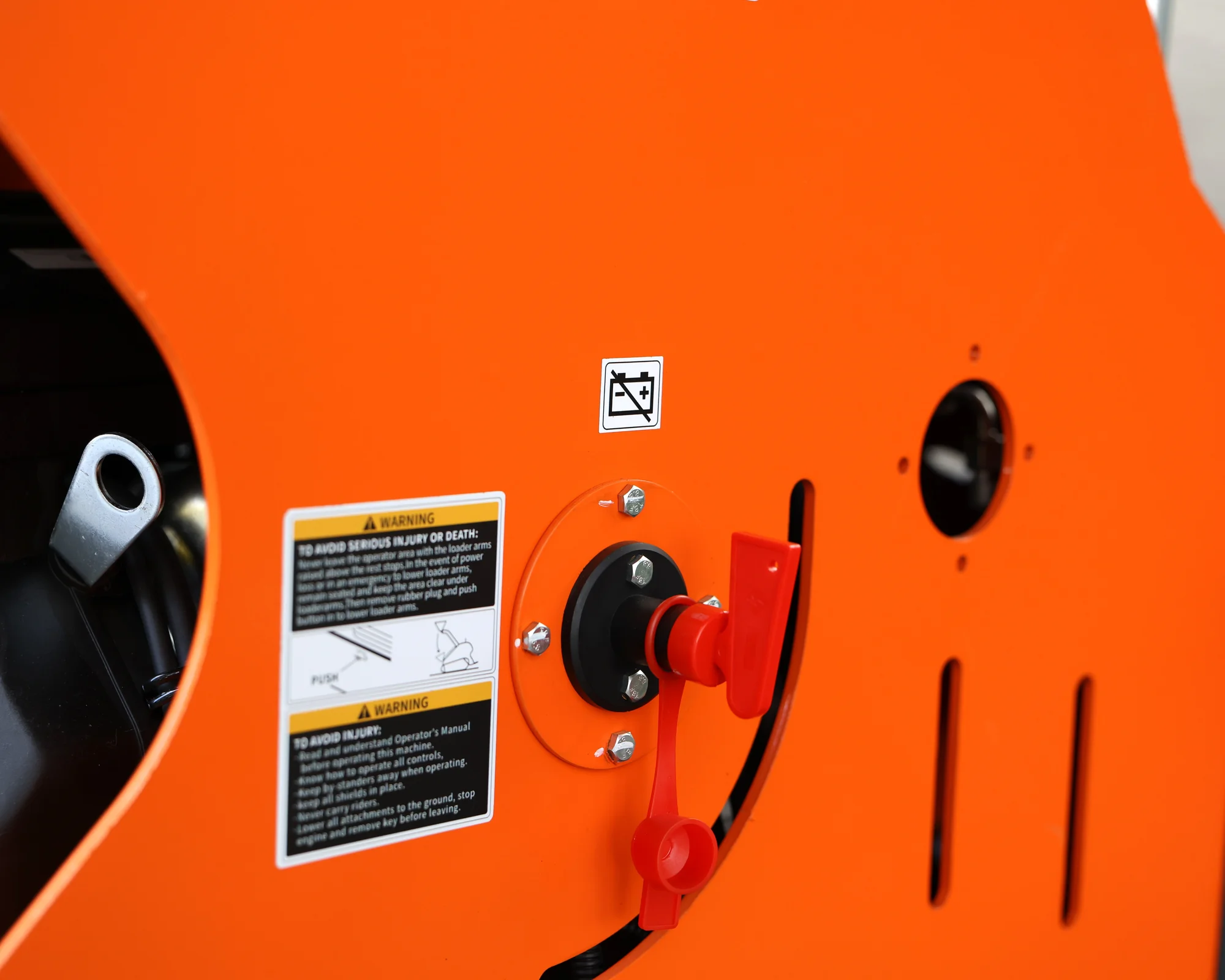 Dig Master DM24 orange mini skid steer: battery disconnect switch