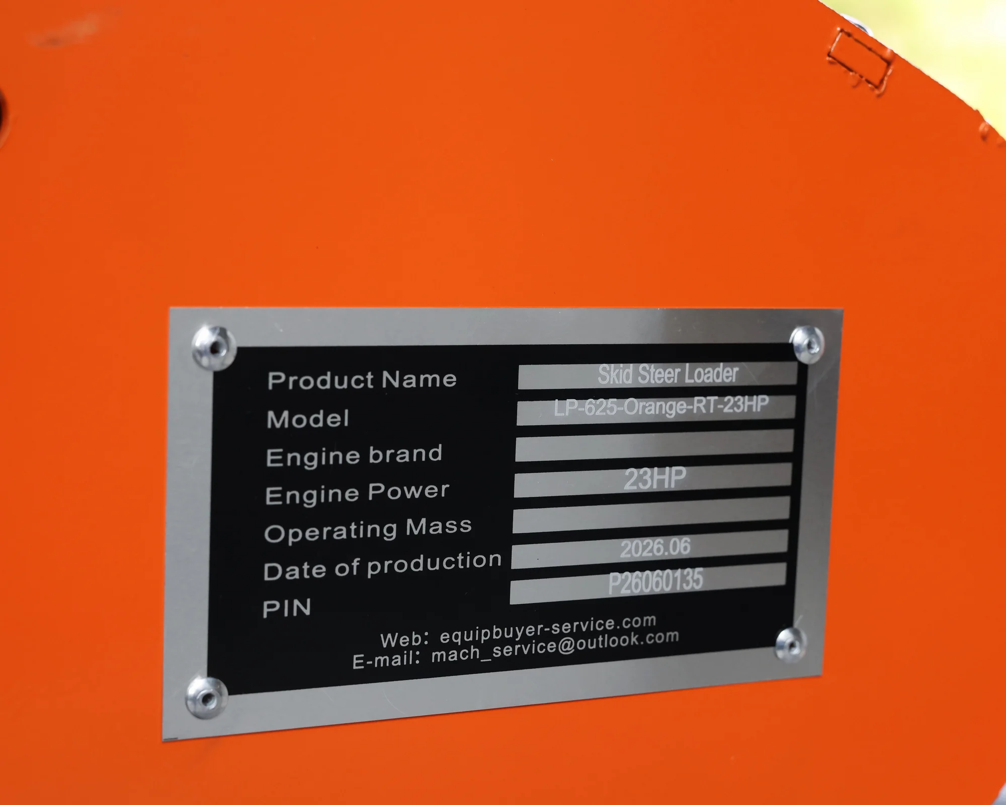 Dig Master DM24 orange mini skid steer: manufacturer 23hp identification plate