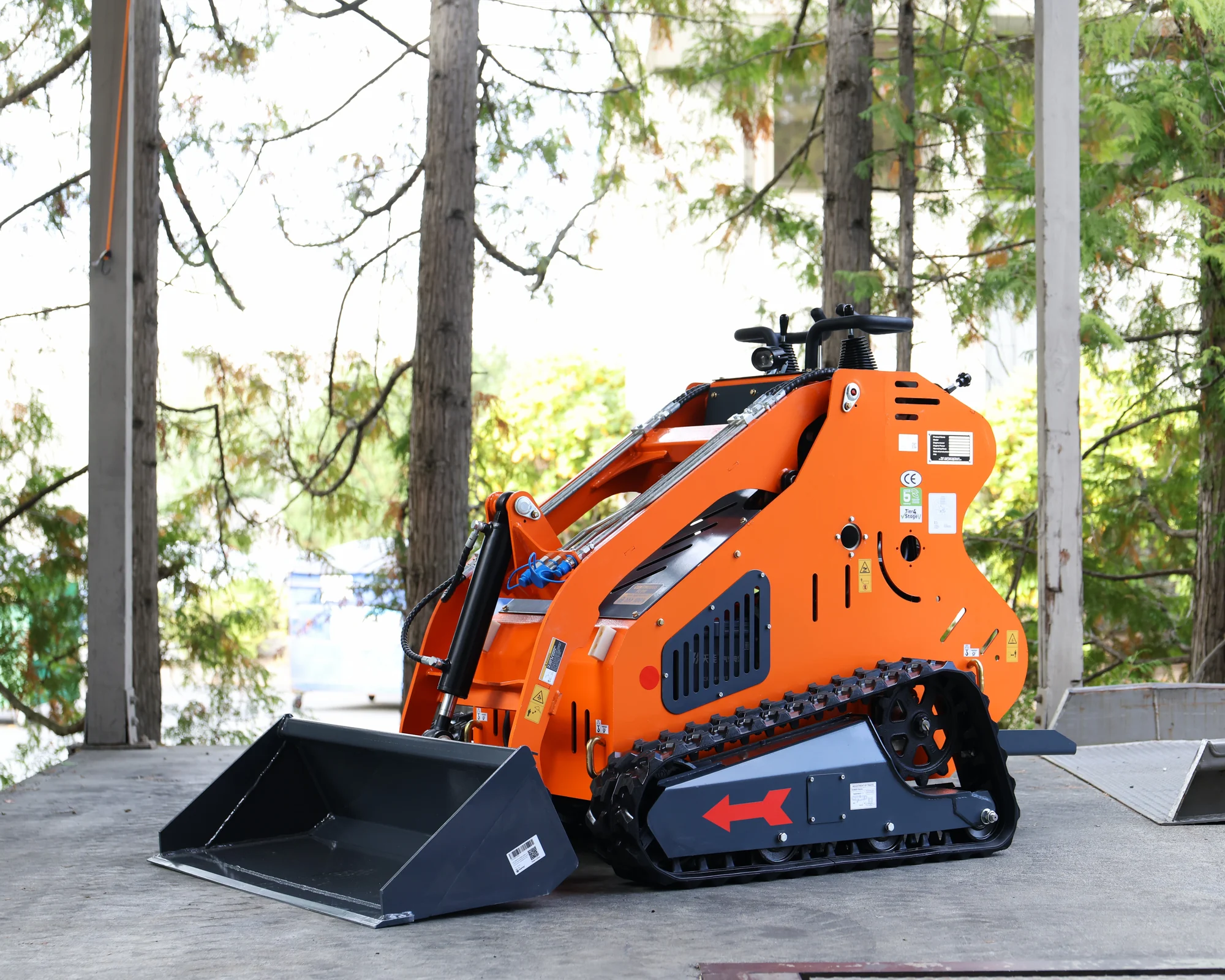 Dig Master DM24 orange tracked loader with included general-purpose bucket